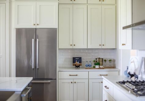 White Kitchen Cabinet Paint Color: Benjamin Moore China White.  Cottage Home Company.  Shuman Mabe Interiors, LLC. Benjamin Moore Linen White Cabinets, White Kitchen Cabinet Paint Color, Benjamin Moore White Cabinet Colors, China White Benjamin Moore, White Dove Oc-17 Benjamin Moore, White Kitchen Quartz, Benjamin Moore White Oc-151, Benjamin Moore China White, White Kitchen Paint Colors