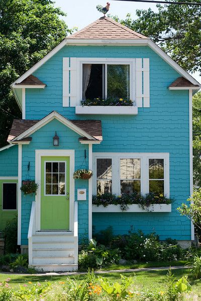 You can't take yourself too seriously when you live in a turquoise house with pale green door and a rooster on the roof. Southern Beauty, House Of Turquoise, Blue Cottage, Cottage Cabin, Green Door, Cute House, Cabins And Cottages, Tiny House Living, Cozy Cottage