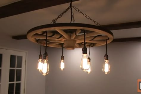 Wagon Wheel Chandelier Diy, Wagon Wheel Light, Wheel Lamp, Wagon Wheel Decor, Chandelier Diy, Barn Lights, Mason Jar Lights, Old Wagons, Diy Light Fixtures