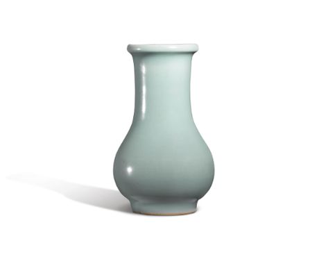 A 'LONGQUAN' CELADON VASE SOUTHERN SONG DYNASTY The pear-shaped body rising from a short tapered foot to a tall cylindrical neck and everted rim, the glaze of an even attractive bluish-green color thinning at the lip.  Sold. 93,750 USD;  16/03/16.   ||| sotheby's n09477lot7tgwqen Celadon Pottery, Longquan Celadon, Beautiful Sculptures, Room London, Art Chinois, Ceramic Glazes, Chinese Pottery, Song Dynasty, Tea Bowl