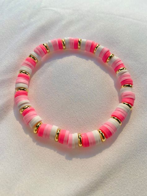 Pink bracelet with gold spacers, very stretchy and high quality! Pink Beaded Bracelets Aesthetic, Clsy Bracelets, Bracelet Inspo Preppy, Clay Bead Bracelet Tutorial, Preppy Thread Bracelets, Cute Pink Bracelets, Light Pink Clay Bead Bracelet, Bead Combos, Preppy Beaded Jewelry