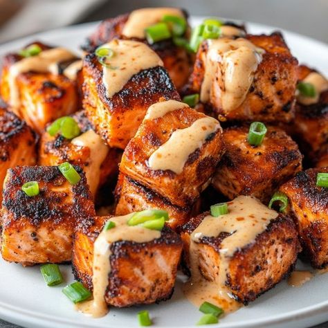 Tasty Recipes & Cooking Ideas by Thalia's Tasty | Blackened Salmon Bites with Creamy Cajun Sauce | Facebook Blackened Salmon Bites, Creamy Cajun Sauce, Cajun Sauce, Salmon Bites, Blackened Salmon, Salmon Fillet, Grilled Salmon, Salmon Fillets, Tasty Recipes