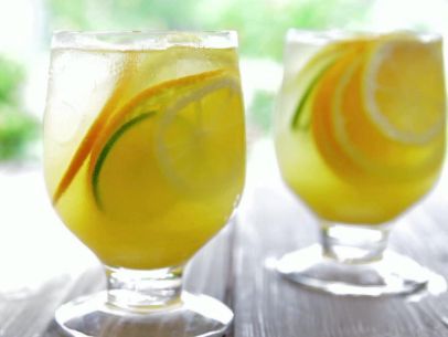 Tequila Sangria Recipe : Bobby Flay : Food Network Tequila Sangria, Sliced Fruit, Bobby Flay Recipes, Sangria Recipe, Lime Soda, Bobby Flay, Drink Drank Drunk, Sangria Recipes, Agave Syrup