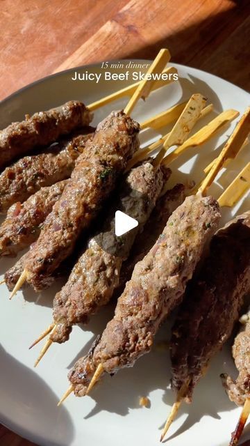 Layla on Instagram: "Ground Beef Skewers// recipe 📩  Ingredients: -1 lb ground beef  -1/4 cup parsley  -1/4 cup grated white onion -1 tbsp gee butter  -5-6 cloves minced garlic  -2 tsp salt  -1 tsp black pepper  -1 tsp garlic powder  -1 tsp cumin  -1/4 tsp ginger powder (optional)  -1/2 tsp ground coriander  -1/4 tsp all spice   Directions: 1. Mix in the parsley, onion, gee butter, garlic, & spices into the ground beef  2. Warm up a skillet and grease it with gee butter.  3. Using soaked wooden skewers or metal skewers, tightly wrap 1/4 cup of the beef onto the skewer. 4. Cook each skewer for 3-5 min until each side becomes charred 5. Enjoy with garlic sauce or tzatziki   #easyrecipes #beefskewers #beefkebab" Ground Beef Skewers, Wooden Skewers, All Spice, Metal Skewers, Beef Skewers, Ginger Powder, White Onion, Recipe Ingredients, Garlic Sauce