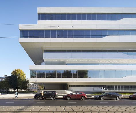 Located in southeast Moscow, the seven-story Dominion Office Building achieves a sense of lightness, despite its large size, due to its long ribbon windows and staggered, cantilevered white volumes. Cantilever Architecture, Architecture Panel, Office Building Architecture, Tadao Ando, Architecture Wallpaper, Zaha Hadid Architects, Wallpaper Magazine, Zaha Hadid, Start Ups