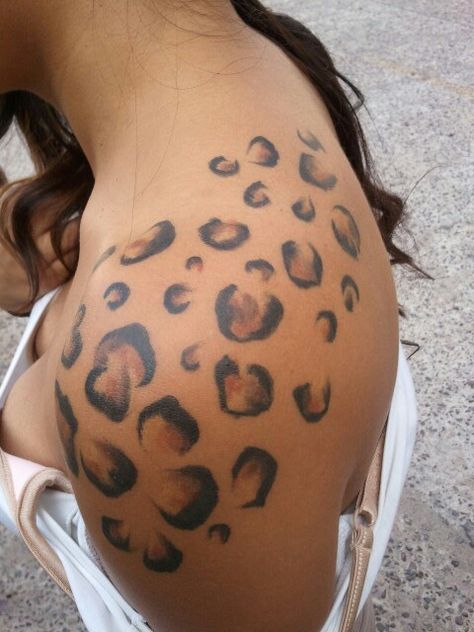 Cheetah Flower Tattoo, Leopard Print Tattoos For Women, Lepord Print Tattoo Ideas, Cheetah Spots Tattoo, Leopard Print Shoulder Tattoo, Cheetah Shoulder Tattoo, Leopard Spot Tattoo, Leopard Print Arm Tattoo, Leopard Arm Tattoos For Women