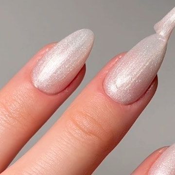 Jessica White on Instagram: "pearly goodness 🪩 @opi @opinailsuk Gemini & I #nails #nailreel #nailinspo #nailtrends #nailswatch #nailpainting #nailasmr #asmr #satisfying #satisfyingvideos #trending #trendingreels #nailcolour" Pearlescent Nails White, Opi Gemini And I, Pearlised Nails, Shimmery White Nails, White Shimmery Nails, Pear Nails, Pearly White Nails, White Shimmer Nails, Pearly Nails