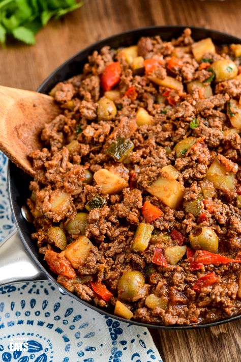 Cuban Beef Picadillo - a delicious hearty ground beef Cuban inspired recipe with flavoursome spices, potatoes, vegetables, olives and sultanas. #Cuban #picadillo #olives #beef #slimmingworld #weightwatchers #glutenfree #dairyfree Ground Beef Picadillo, Cuban Beef, Ground Bison Recipes, Cuban Picadillo, Beef Picadillo, Bison Recipes, Colombian Recipes, Picadillo Recipe, Potatoes Vegetables