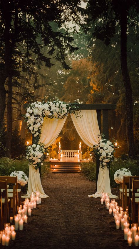 An evening forest wedding scene with candles, an archway, flowers and fantasy vibes. Boujee Backyard Wedding, Gazebo Wedding Ideas, Wedding Outline, Simple Wedding Sets, Weddings Decorations Elegant Romantic, Chic Wedding Venues, Wedding Vow Renewal Ceremony, Nautical Wedding Favors, Fairytale Wedding Theme