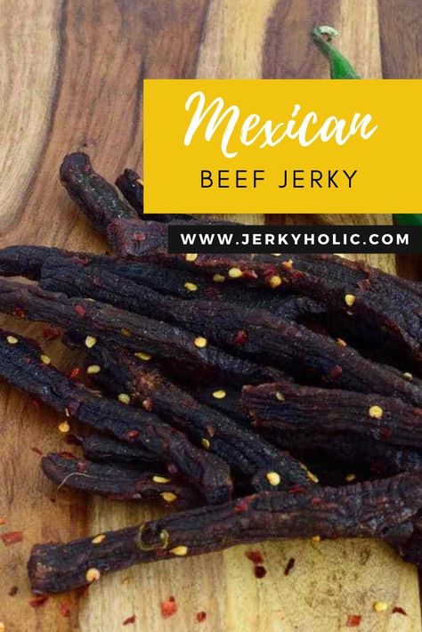 Mexican Beef Jerky with pepper flakes on a wooden background. Spicy Beef Jerky Recipe Dehydrator, Spicy Jerky Marinade Recipes, Hot And Spicy Beef Jerky Recipe, Spicy Jerky Recipe, Deer Jerkey, Spicy Beef Jerky Recipe, Jerky Marinade Recipes, Beef Jerky Recipe Dehydrator, Jerky Recipes Dehydrator