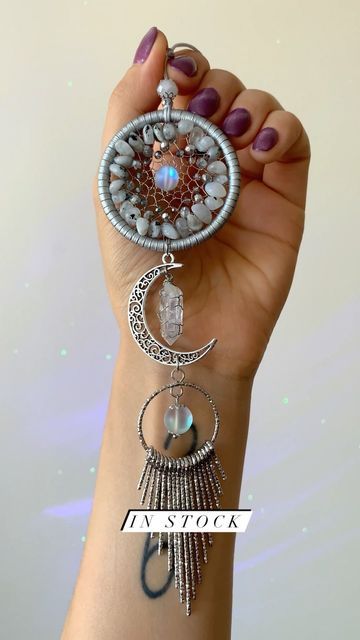 Moonstonia on Instagram: "✨Small Dream catcher with Moonstone and Aura Quartz point✨Available now in my Etsy. #dreamcatcher #suncatcher #moonstone #carcharm #cardecor #silver #crystals #auraquartz #quartzcrystal #sparkling #giftideas #rearviewmirror" Wire Wrap Dream Catcher, Dreamcatcher Suncatcher, Banana Craft, Crystal Dreamcatcher, Banana Crafts, Crystal Dream Catcher, Wire Creations, Dream Catcher Decor, Small Dream Catcher