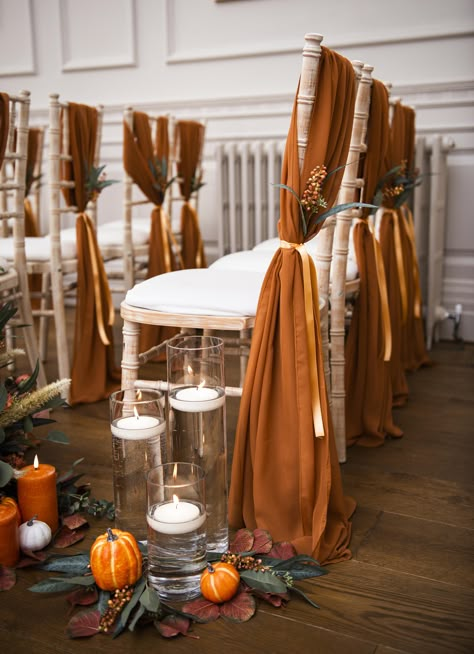 Rustic Autumn Wedding Dress, Autumn Themed Table Decor, Autumnal Wedding Table Decor, Cosy Wedding Decor, Autumnal Wedding Ideas, Autumn Wedding Ceremony Decor, Autumn Aisle Decorations, Fall Wedding Chair Decor, Fall Wedding Venue Ideas