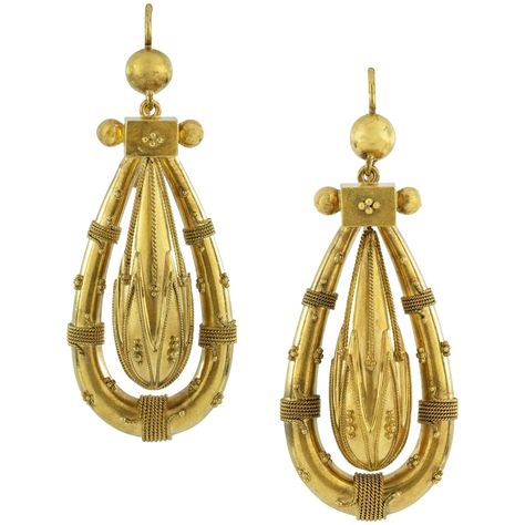 A pair of Victorian Etruscan Revival gold drop earrings, each earring consisting of a pendulum drop centre and golden horseshoe frame, all with a granular bead and wire-work decorations, all suspended Victorian Gold Earrings, London Jewelry, Victorian Earrings, Vintage Drop Earrings, Victorian Gold, Classy Jewelry, Bespoke Jewellery, Antique Earrings, Victorian Jewelry