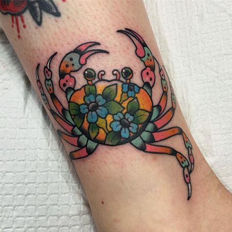 Floral crab tattoo Colorful Crab Tattoo, Old School Crab Tattoo, Crab Neck Tattoo, Crab Hand Tattoo, Neotraditional Crab Tattoo, Crab Flower Tattoo, Neo Traditional Crab Tattoo, Blue Crab Tattoo For Women, Heikegani Tattoo