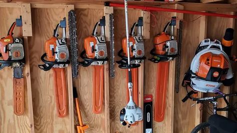 How to Store a Chainsaw So It Doesn’t Leak Oil Chainsaw Holder For Garage, Chain Saw Storage Ideas, Storing Chainsaws, Chainsaw Organization, Chainsaw Storage Box Diy, Backpack Blower Storage, Chain Saw Storage, Chainsaw Rack, Chainsaw Storage Ideas