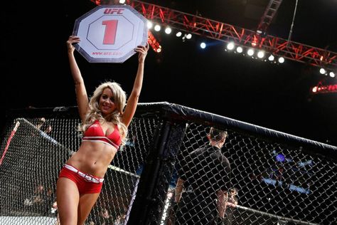 New UFC Octagon Girl Carly Baker introduces a round during the UFC on Fuel TV event on February 16, 2013 at Wembley Arena in London, England. Octagon Girls, Combat Sports, Ufc, Dancer