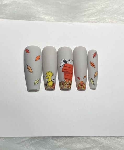 Woodstock and snoopy nails | snoopy nails | comes with buffer, cuticle pusher, nail glue ! Snoopy Fall Nail Designs, Snoopy Nails Fall, Snoopy Thanksgiving Nails, Snoopy Nails Design, Charlie Brown Thanksgiving Nails, Snoopy Fall Nails, Snoopy Christmas Nails, Peanuts Nails, Charlie Brown Nails