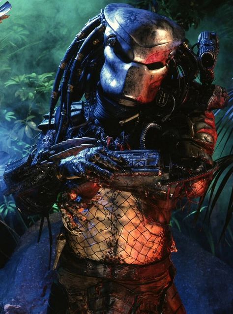 The Jungle Hunter is the titular main antagonist of the 1987 science-fiction/action film Predator. He is a member of the Yautja race who was sent to Earth deep into the Val Verde jungle to complete a hunt and kill worthy human prey. The Hunter's prey is a group of highly trained and skilled American mercenaries, led by Dutch Schaefer, who are there to rescue CIA hostages, however, one by one the team fell victim to the brutal creature. He was portrayed by the late Kevin Peter Hall, who also port Predator 1987, Predators Film, Predator Artwork, Predator Alien Art, Predator Movie, Practical Effects, Arte Alien, The Predator, Battle Armor