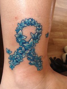 Ribbon Tattoo Designs, Survivor Tattoo, Awareness Tattoo, Ribbon Tattoos, Mom Tattoos, Thigh Tattoo, Heart Tattoo, Blue Ribbon, Flower Tattoos