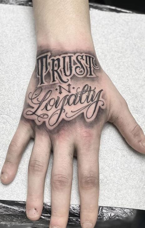 Men’s Tattoos Hands, Self Made Hand Tattoos For Men, Trust N Loyalty Tattoo Hand, Hand Tattoo Outline Drawing, Hand Word Tattoos For Guys, Nice Hand Tattoos For Guys, Trust None Hand Tattoo, Respect Hand Tattoo, Creative Hand Tattoos For Men