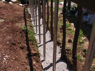 Rapidobe - a Cheap Way to Build Walls, Retaining Walls, Benches and Shelves : 7 Steps (with Pictures) - Instructables Cheap Retaining Wall, Natural Shelves, Landscape Steps, Garden Fire Pit, Retaining Walls, Metal Pipe, Block Wall, Retaining Wall, Design Challenges