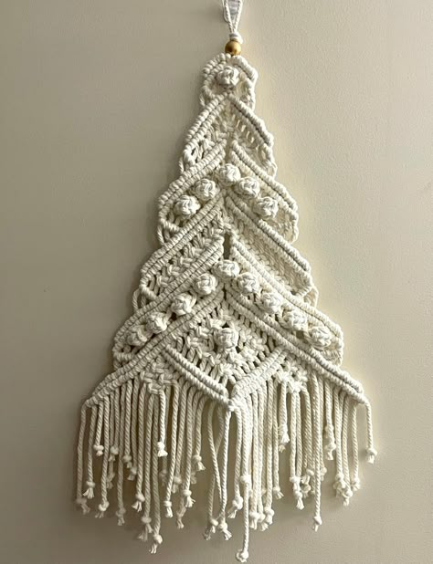 "Handmade macrame Christmas tree. Appropriately 20\" long and 12\" wide. Comes in white or dark green" Macrame Christmas Decorations Diy, Large Macrame Christmas Tree, Macrame Christmas Garland, Macrame Christmas Tree Tutorial, Holiday Macrame, Christmas Macrame, Macrame Christmas Tree, Crochet Yarns, Wall Christmas Tree