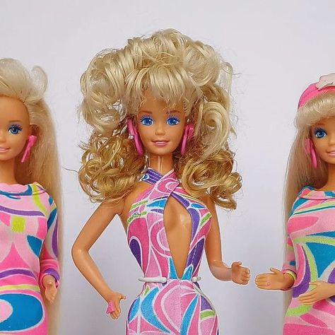 80s Barbie on Instagram: "💞💞Fabulousness overload💞💞 💕I literally fell in love with this jumpsuit made by @salvadorlopezarriaga . It has the same pattern like Totally Hair Barbie's dress. I knew i needed it for one of my girls. It goes so well with the curls, i love so much my curly girl and they were made for each other. I know already that i'm going to have sooo much fun with this fashion💕 💞Totally hair Barbie 1991, Style Magic Barbie 1988 wearing a wonderful jumpsuit designed by @salvadorlopezarriaga and another beautiful Totally Hair Barbie 1991 in her original dress💞 💞💞In Love💞💞  #stylemagicbarbie #barbiestylemagic #totallyhairbarbie #barbietotallyhair #70sbarbie #80sbarbie #90sbarbie #vintagebarbie #barbievintage #barbiefashion #barbiestyle #instabarbie #dollstagram #barbi 80s Barbie, Barbies From The 70s And 80s, 80s Barbie Art, Vintage Barbie Clothes 70s, Barbie’s From The 90s, Totally Hair Barbie, Totally Hair Barbie 1991, Barbie 80s, Barbie Dress Pattern