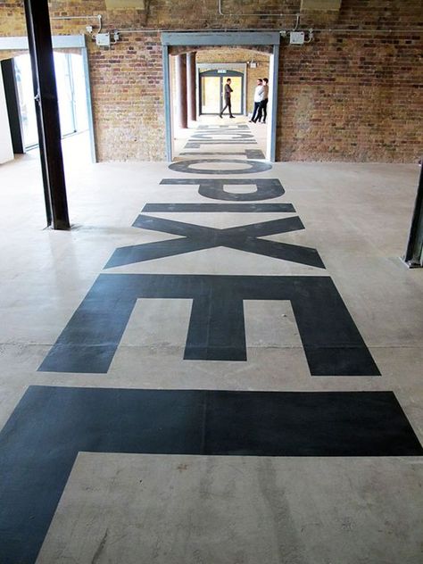 Industrial Signage Design, Floor Logo Design, Floor Wayfinding, Startup Office Design, Signage Exhibition, Large Typography, Floor Signage, Industrial Exhibition, Startup Design