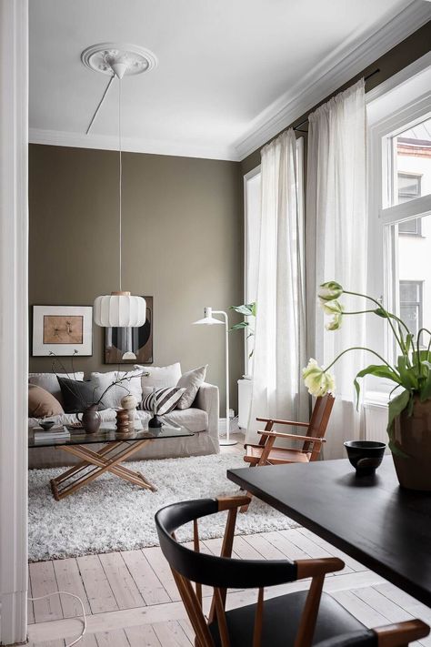 Dark Green Kitchen, Swedish Interiors, Light Wooden Floor, Olive Green Walls, Living Colors, Scandinavian Apartment, Stylish Apartment, Green Walls, Exposed Brick Walls