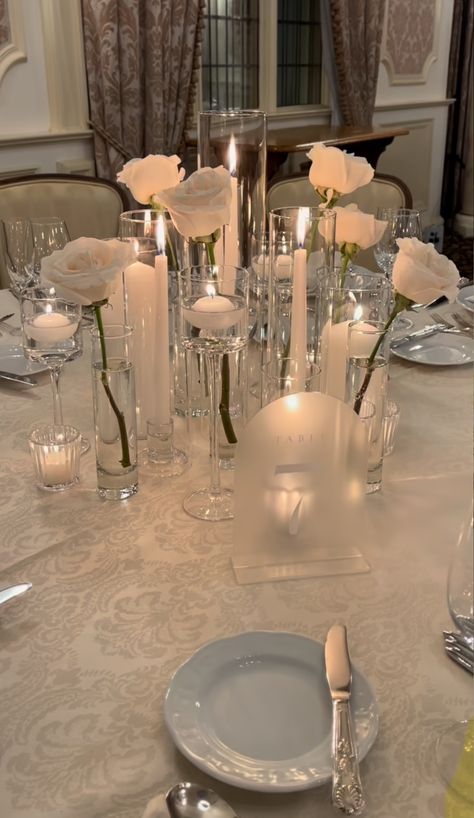 Sweetheart Table Using Brides Bouquet, Timeless Wedding Decor Round Table, White Linen Wedding Table, Single Stem Roses Wedding Table, Center Piece For Dining Table Weddings, White Silver Wedding Decor, Ivory Table Setting, Wedding Cake All White, Black Table Cloth Wedding