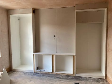 This IKEA PAX hack adds EKET cabinets for a built-in closet | Livingetc Closet In Wall Ideas, Ikea Pax Tv Built Ins, Ikea Alcove Wardrobe Hack, Ikea Pax Media Wall, Ikea Pax Closet Wall, Pax Wardrobe With Tv, Ikea Pax Wardrobe Alcove, Ikea Pax Wardrobe With Tv, Ikea Pax Living Room