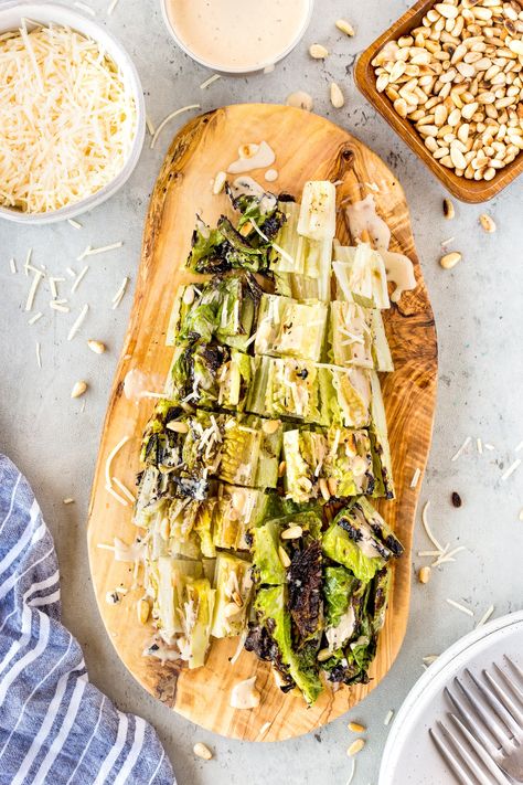 This Grilled Caesar Salad is the perfect dish to serve as a side or with chicken, it can be a main dish! Grilled Ceasar Salad, Grilled Caesar Salad Recipe, Grilled Lettuce, Grilled Romaine Hearts, Grilled Caesar Salad, Grilled Salad, Grilled Romaine, Caesar Salad Recipe, Good Ideas