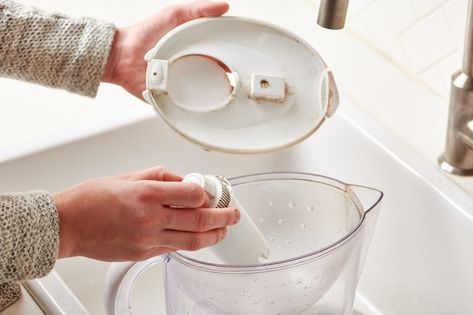 How To Clean a Brita Pitcher | Kitchn Pitcher Of Water, Brita Pitcher, Brita Water Filter, Brita Filter, Water Filter Pitcher, Mini Fridges, Vinegar And Water, Water Pitchers, Good Housekeeping