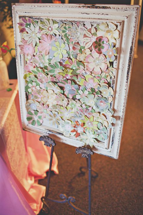 Our sign in frame. Our guests signed their name or their families name on a paper flower and pinned it onto this frame. Now instead of throwing a sign in book in a box in the garage, I can hang it somewhere in my home and see it all the time. :) 10-08-11 Artsy Guest Book Ideas, Guest Book Art Piece, Garden Wedding Guest Book, Guest Book Floral Arrangement, Guest Book Table Flower Arrangement, Flower Guest Book, Shadow Box Hearts Guest Book, Guess Book, Decoration Tips