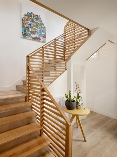 50 Stair Railing Ideas to Dress Up Your Entryway | HGTV Contemporary Staircase Design, Indoor Stair Railing, Wooden Railing, Wood Railings For Stairs, Metal Stair Railing, Indoor Railing, Interior Stair Railing, Staircase Designs, Contemporary Staircase