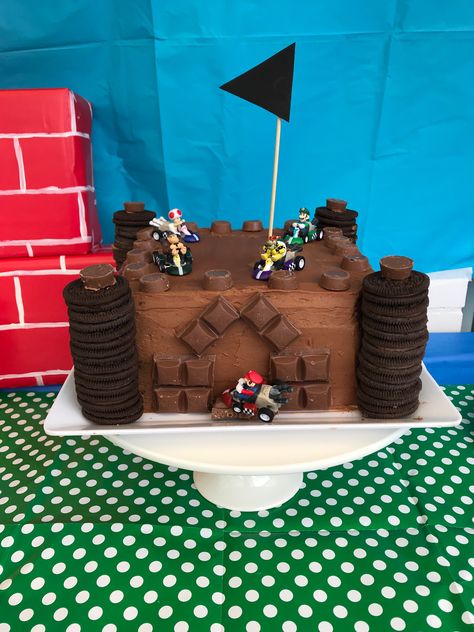 Bowser’s castle Mario party Bowser Birthday Party Cake, Bowsers Castle Diy, Bowser Jr Birthday Cake, Bowser Castle Cake, Bowser Birthday Party, Bowser Cake, Bowser Birthday, Bowser's Castle, Christmas Brownie