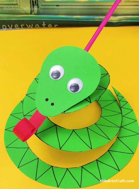 25 Easy Snake Crafts for Kids (Preschoolers & Toddlers) Preschool Crafts Wild Animals, Sneaky Snake Bible Craft, Reptile Crafts For Preschoolers, Letter S Snake Craft, Snake Crafts For Preschool, Paper Plate Snake Craft, Lizard Crafts For Toddlers, Reptiles For Preschoolers, Snake Crafts For Toddlers