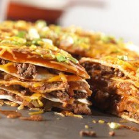 Enchilada Stack, Stacked Enchiladas, Cheesy Enchiladas, Cheese Enchiladas, Shredded Cheddar Cheese, Beef Enchiladas, Enchilada Sauce, Mexican Recipes, Refried Beans