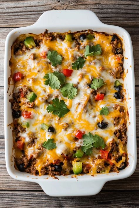 Looking to switch up your weeknight dinner routine? Try making a delicious and comforting casserole for the whole family to enjoy. From cheesy pasta bakes to hearty chicken and rice dishes, there's a casserole recipe out there for everyone. If you're looking for something with a little more kick, why not whip up some loaded nachos? Beef Nacho Casserole, Nachos Casserole, Nacho Casserole Recipe, Nacho Casserole, Best Casserole, Baked Nachos, Cheesy Pasta Bake, Nacho Dip, Pasta Bakes