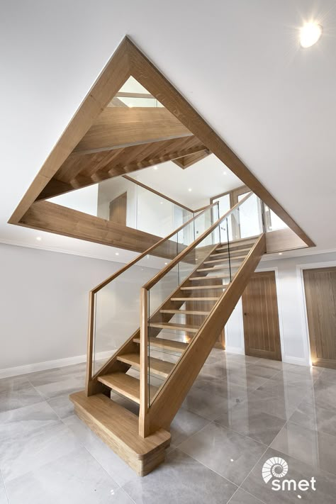 This is one of our latest projects, two straight staircases in East Grinstead. The large windows, open riser staircases and glass panelled balustrades definitely make for a winning combination.  The gap between each tread was reduced with glass semi-risers, and the solid French Oak handrail vertically returns to the first tread. Click to see more pictures. Designer Staircase, Oak And Glass Staircase, Bungalow Extension, Entrance Hallways, Glass Staircase Railing, Hall Stairs, Glass Railings, Timber Staircase, East Grinstead