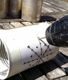 DIY: tin can luminary tutorial... OH! you use a drill, I guess that is easier than a nail and hammer Tin Can Lights, Luminaria Diy, Can Lanterns, Tin Can Lanterns, Can Lighting, Craft Table Diy, Recycled Tin Cans, Tin Can Art, Punched Tin