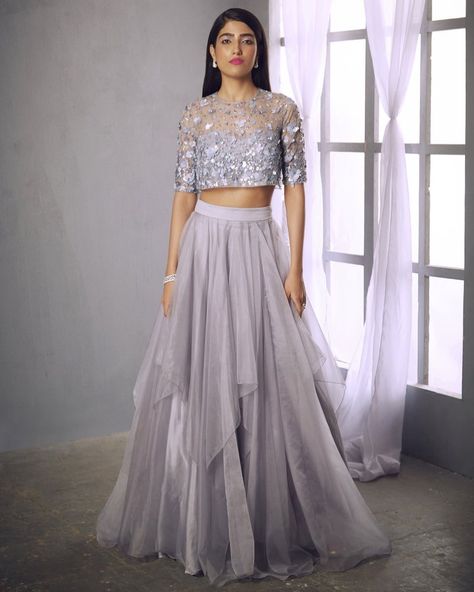 A loose fitting crop so you can let loose on the dance floor 💃🏽 Tap pic to shop the Gemini #lehenga! #indianapparel #indianwedding #lilaclehenga #greylehenga #silverlehenga #croptop #organzalehenga #shlokakhialani Designer Bridal Lehenga Choli, Embellished Crop Top, Designer Bridal Lehenga, Organza Skirt, Lehenga Style, Lilac Grey, Grey Crop Top, Lehenga Collection, Bridal Lehenga Choli