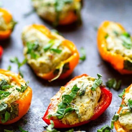 Pesto Stuffed Sweet Pepper Poppers - Stuffed with a super flavorful creamy pesto filling, these pesto stuffed sweet pepper poppers are SUPER addicting and the perfect little party app! Easy Fall Party Food, Sweet Pepper Poppers, Easy Party Snacks, Pepper Poppers, Fall Party Food, Bbq Chicken Sliders, Party Snacks Easy, Dessert Hummus, Mini Sweet Peppers