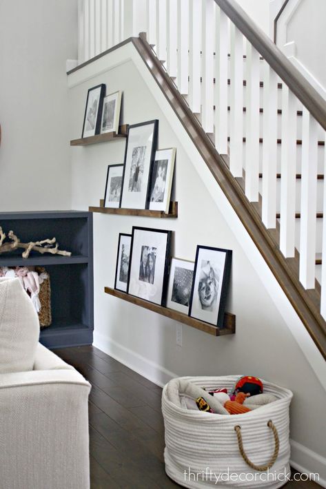 Picture ledges to create a gallery wall of black framed photographs on a staircase Decorate My Room, Pottery Barn Look, تحت الدرج, Koti Diy, Barn Pictures, Stair Wall, Thrifty Decor Chick, Picture Ledge, Wall Gallery