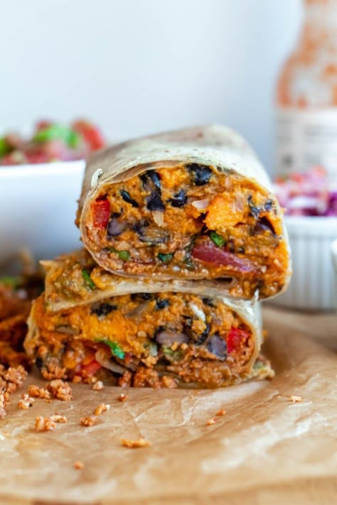 These Vegan Sweet Potato and Black Bean Burritos are so satisfying, thanks to their fillings, which include cauliflower walnut taco meat, avocado salsa, black beans, and sweet potatoes. Potato Burrito Recipe, Potato Burritos, Walnut Taco Meat, Sweet Potato Veggie Burger, Black Bean Burritos, Sweet Potato Burrito, Sweet Potato Wrap, Food For Winter, Black Bean Sweet Potato