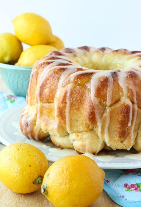 Buttery bun dough rolled in lemon sugar, baked, and covered in a thick lemon glaze! Get the recipe here. Lemon Monkey Bread, Savory Monkey Bread, Bread Recipe Video, Homemade Buns, Lemon Glaze, Lemon Sugar, Monkey Bread, Lemon Desserts, Make Ahead Breakfast