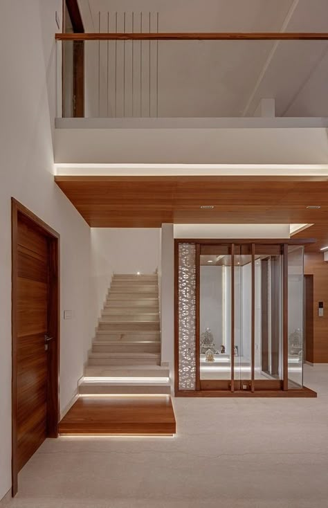 House In The Air | Techno Architects - The Architects Diary Temple Design For Home, Pooja Room Door, Indian Home Design, House Floor Design, Pooja Room Door Design, House Design Pictures, House Arch Design, Pooja Room Design, Room Door Design