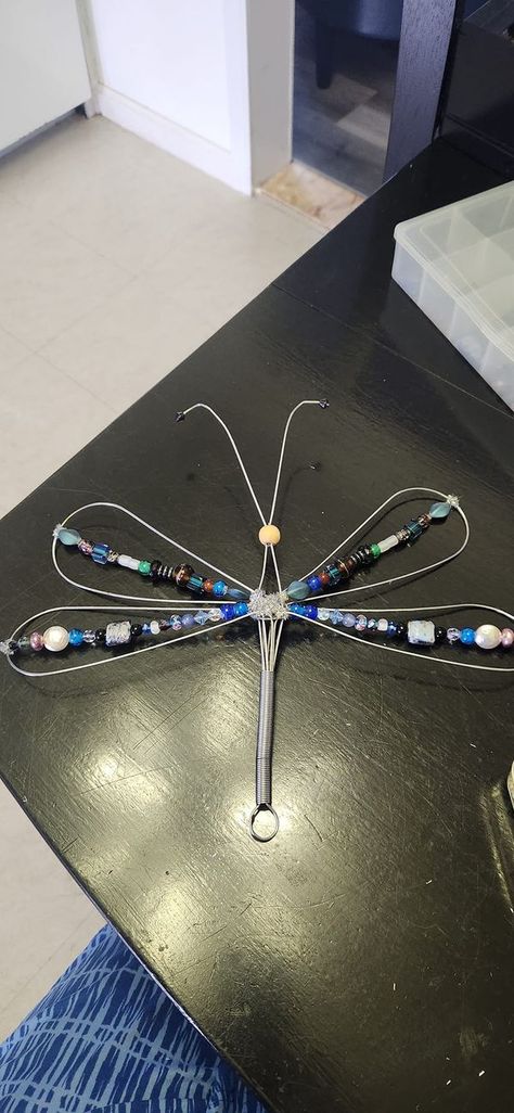 Dollar Tree Fanatics Crafts & Decor | Dragonflies i made today out of whisk from DT and beads i had. Dragonfly Whisk Craft, Dragonfly Whisk, Wire Whisk Dragonflies, Whisk Dragonfly Diy, Whisk Dragonfly, Dragonfly Crafts For Adults, Dragonfly Garden Decor, Roofing Nails, Crystal Suncatchers Diy