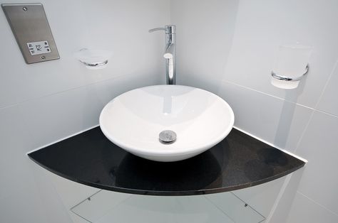 Have you got a small bathroom at home? Don't panic because there are so many ways to maximise the space that you do have. My guide explains how... White Tile Bathroom Walls, Corner Basin, Corner Sink Bathroom, Corner Vanity, Small Bathroom Sinks, Washbasin Design, Modern Bathroom Sink, Small Sink, Corner Sink