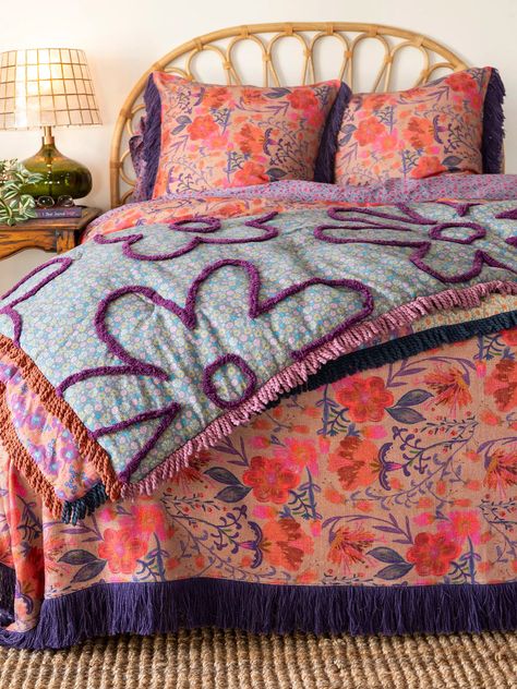 We LOVE our Boho Tufted Reversible Bed Cover in our Calico design! It's a double-sided comforter with tufting and fringe that has large, dark purple tufted flowers over a ditsy floral print on one side, and alternating floral patterns on the other. This bed cover is made from super soft cotton, so you'll be oh-so-cozy Natural Life Bedding, Bed Spreads Boho, Purple Fringe, Room 2023, Bedding Quilt, Door Wraps, Boho Quilt, Boho Life, Daughters Room